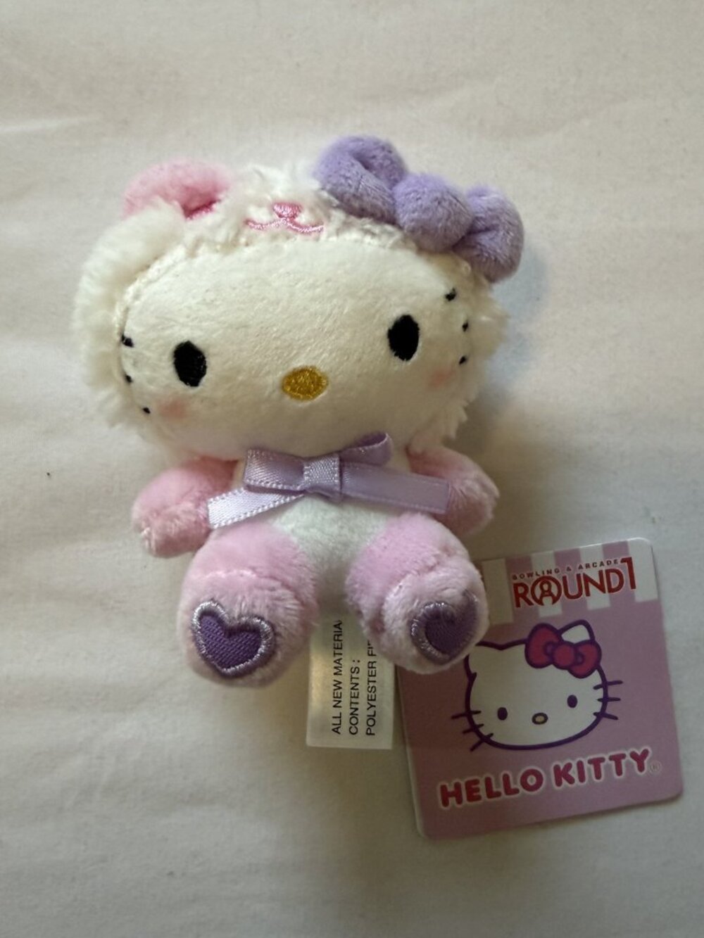 Sanrio Hello Kitty Round1 Exclusive Fluffy White Hood Pink Purple Bow Mini Plush